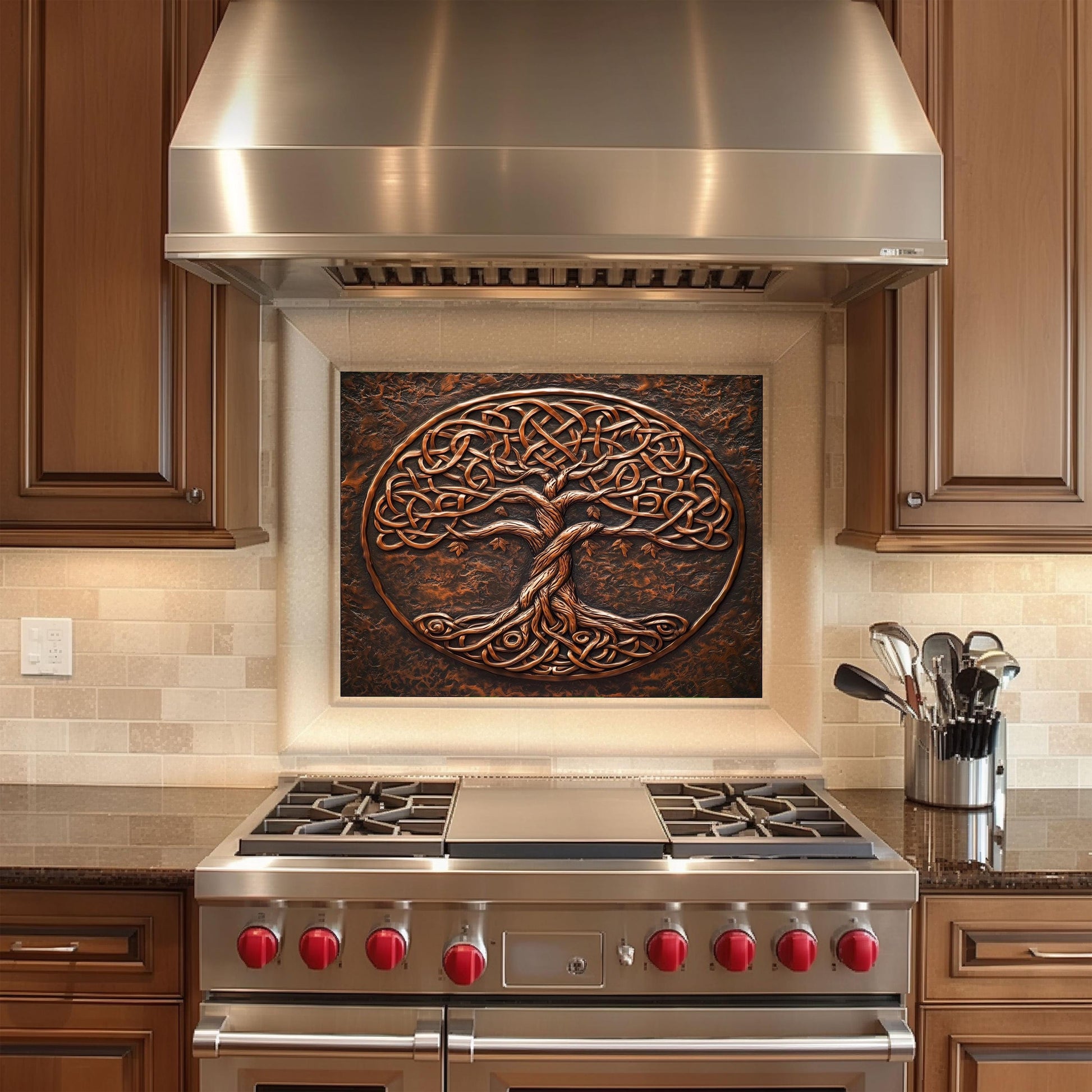 a stove top oven sitting under a metal hood