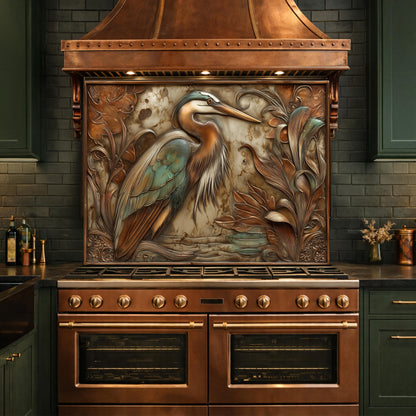 May include: A copper range hood with a decorative panel featuring a heron and foliage. The range has a copper finish with brass accents and a matching oven. The kitchen has dark green cabinets and a dark brick backsplash.